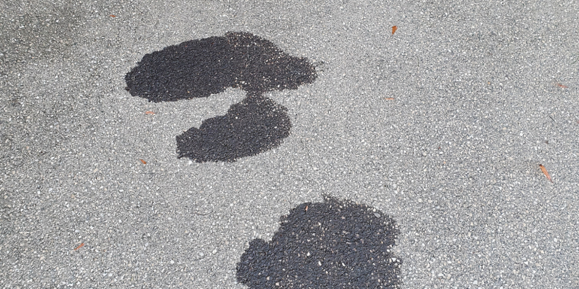 oil stains on asphalt driveway