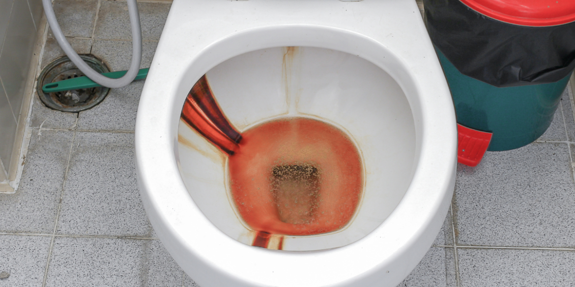 hard water stain  on a toilet