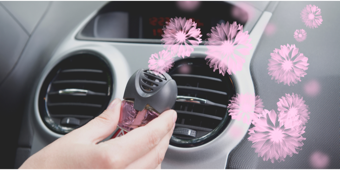 air freshener in car vent to help remove the smoke smell out of a car