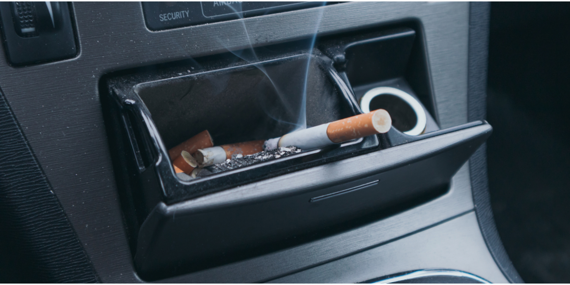 car ashtray full of smoke