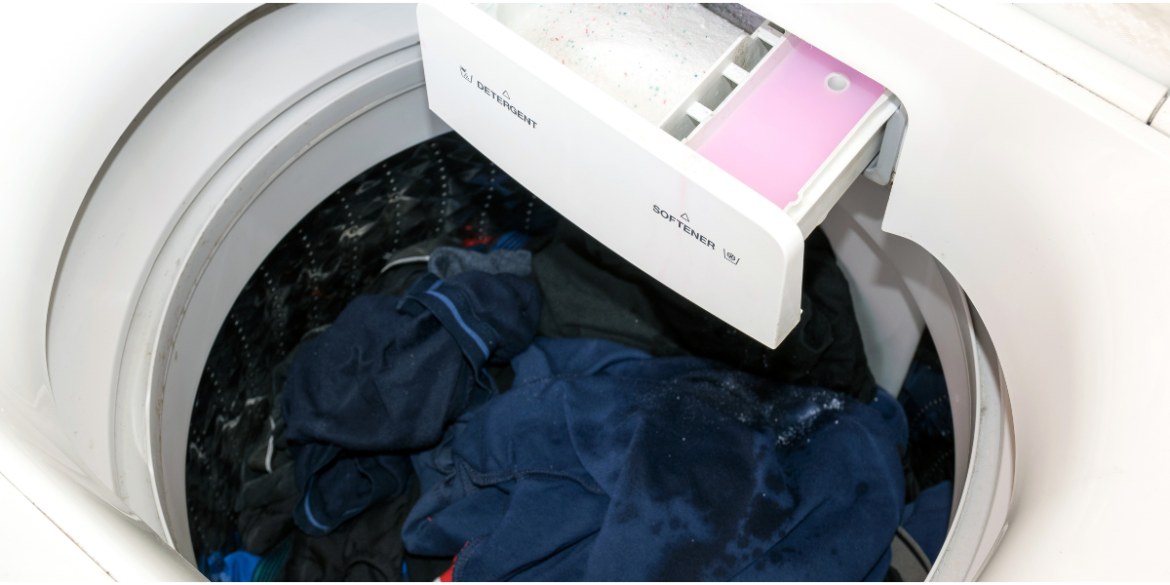 fabric softener stains on laundry in a washing machine