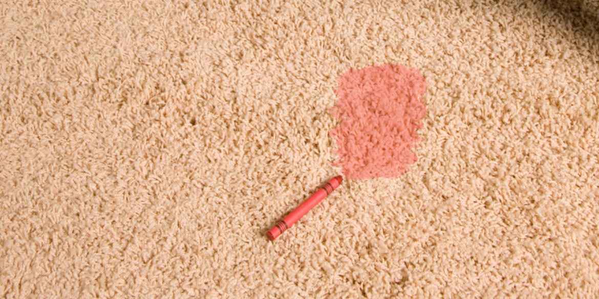 red crayon stain on beige carpet